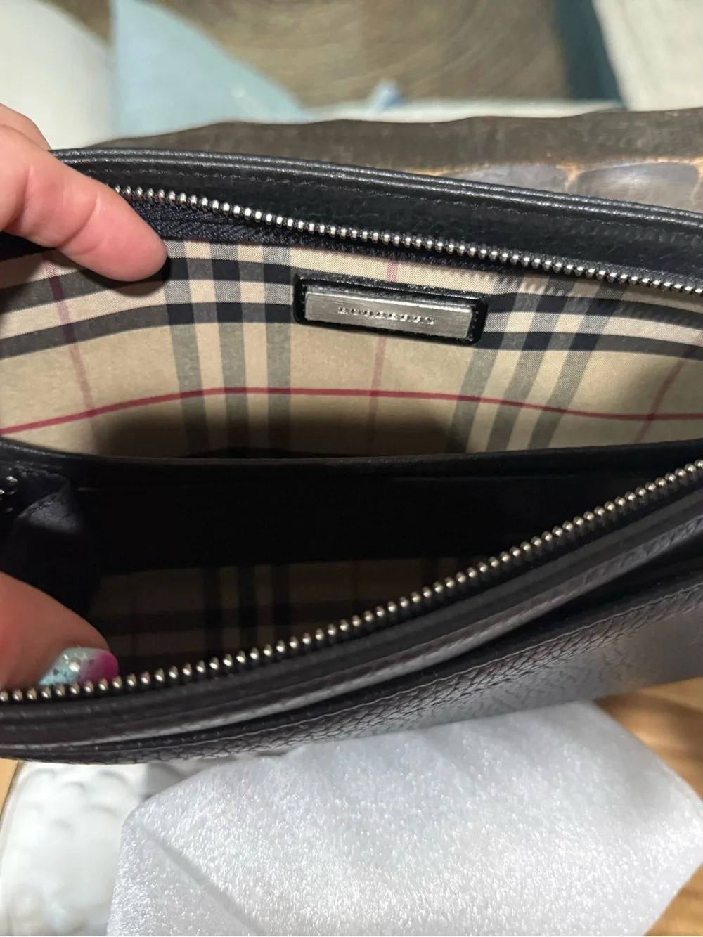 Burberry London black pebbled leather clutch, brand new.